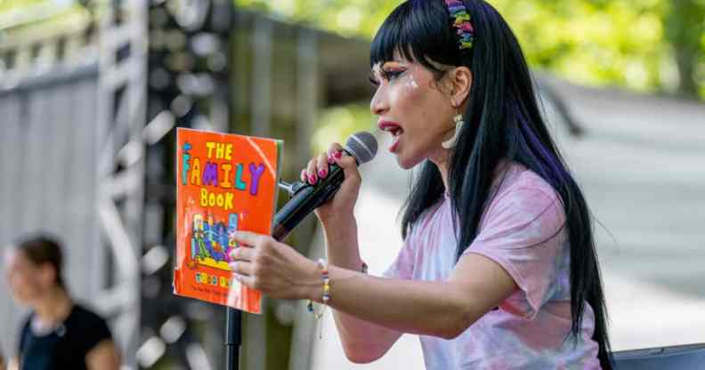 Drag queen Yuhua Hamaskai takes part in a Drag Queen Story Hour event