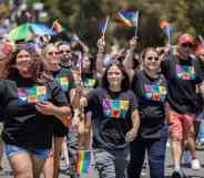 Participants march at the 2022 San Diego Pride Festival And Parade