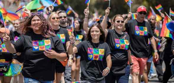 Participants march at the 2022 San Diego Pride Festival And Parade