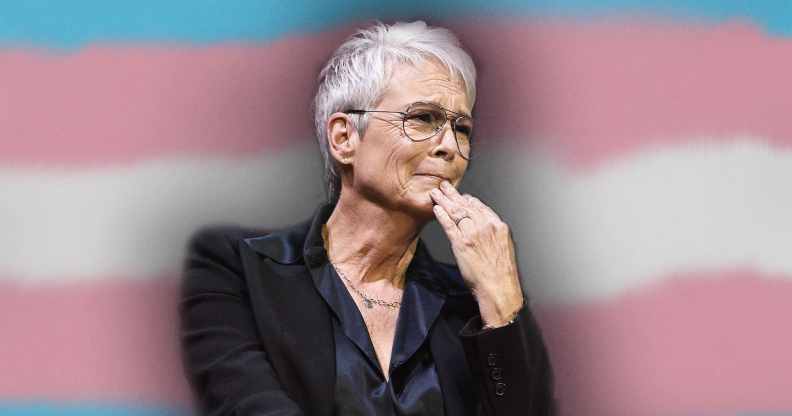 Jamie Lee Curtis in front of the trans flag