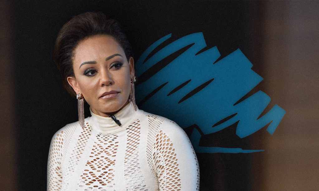 Mel B in front of the Tory logo