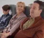 A man, woman and child are seen in a video allegedly produced by the Russian Federation. They are seated on a plane as the husband and wife speak to each other.