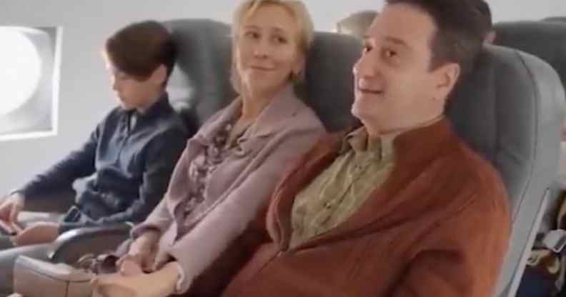 A man, woman and child are seen in a video allegedly produced by the Russian Federation. They are seated on a plane as the husband and wife speak to each other.