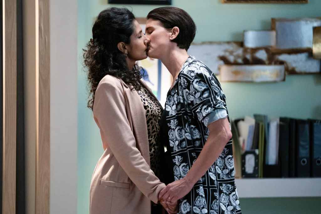 EastEnders' Suki Kaur Panesar (Balvinder Sopal) and Eve Unwin (Heather Pearce) kissing