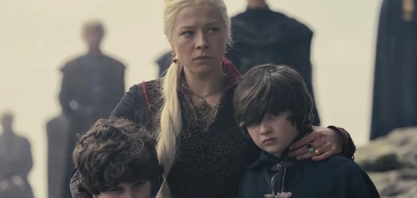 Rhaenyra holding her two young sons