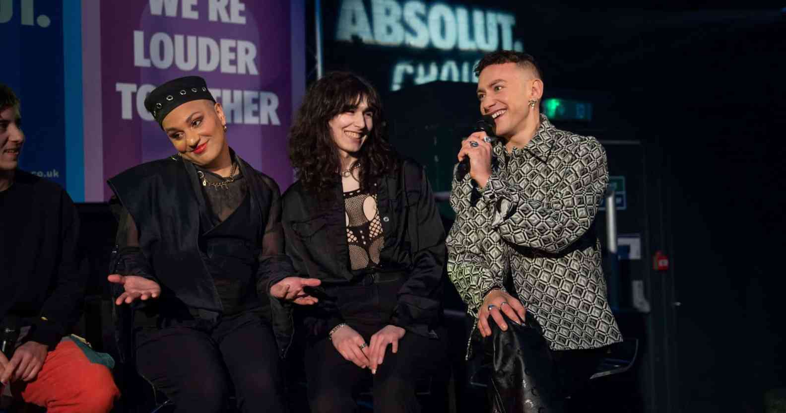 Members of Trans Voices and Olly Alexander speak during the Absolut Choir performance.