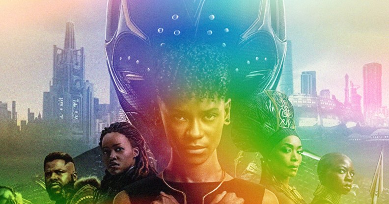 The characters of Black Panther lined up, with the Black Panther mask behind them