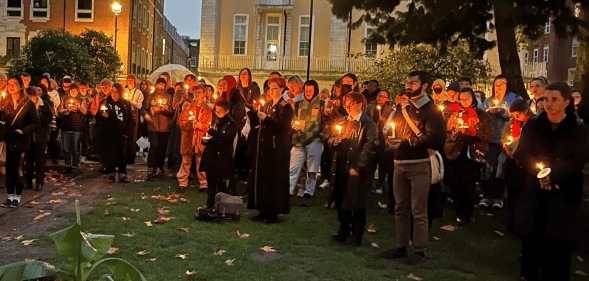 Members of the trans community stand in silent solidarity for those who passed away in 2022