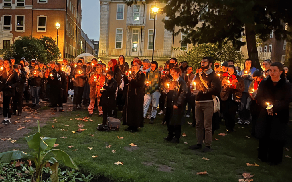 Members of the trans community stand in silent solidarity for those who passed away in 2022