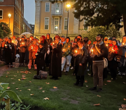 Members of the trans community stand in silent solidarity for those who passed away in 2022