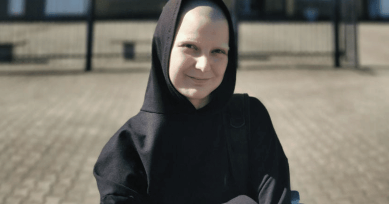 Yulia Tsvetkova wears a black outfit after a Russian court upheld her acquittal on pornography charges