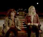 A still from the Norwegian short film Night Ride showing actors Sigrid Husjord and Ola Hoemsnes Sandum who play Ebba and Ariel sitting on a bench at night