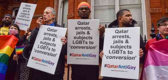 Activists protest outside the Embassy of Qatar in London on the eve of the World Cup