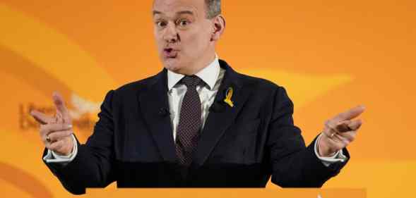 Ed Davey, leader of the Liberal Democrats, speaking at the party's 2022 conference on stage.
