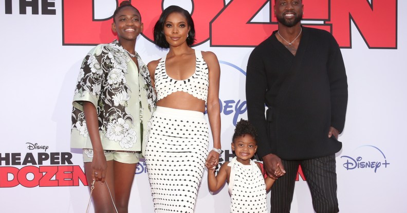 Zaya Wade, Gabrielle Union, Kaavia James Union Wade and Dwyane Wade pose at the premiere of Cheaper by the Dozen