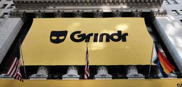 Grindr displays its banner outside of the New York Stock Exchange (NYSE) as the company goes public.