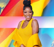 Keke Palmer in front of a rainbow flag