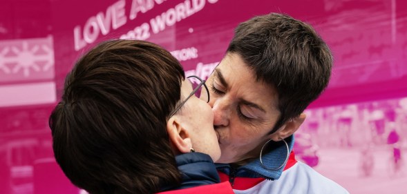 Two people kiss in protest at Qatar laws