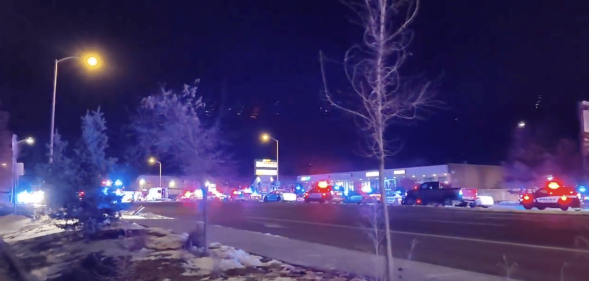 Emergency services arrive at the scene after a mass shooting at a gay bar in Colorado Springs