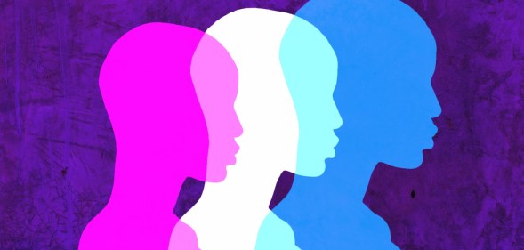 Three silhouettes in the colours of the trans flag