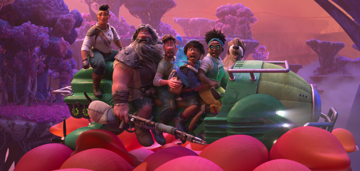 Animated still showing a family of five characters, and a dog, sitting on a green vehicle in a pink alien landscape
