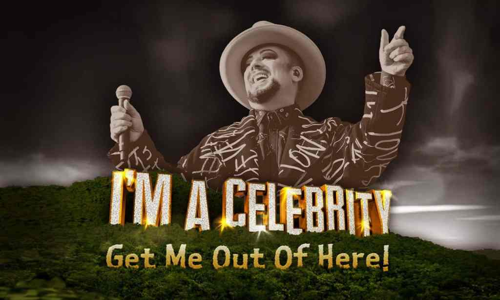 Boy George, wearing a hat and holding a microphone, and the I'm A Celebrity logo