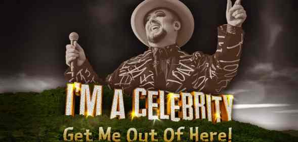 Boy George, wearing a hat and holding a microphone, and the I'm A Celebrity logo