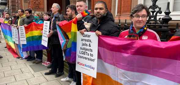 LGBTQ+ activists protest outside the Qatar London embassy.