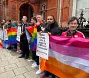 LGBTQ+ activists protest outside the Qatar London embassy.