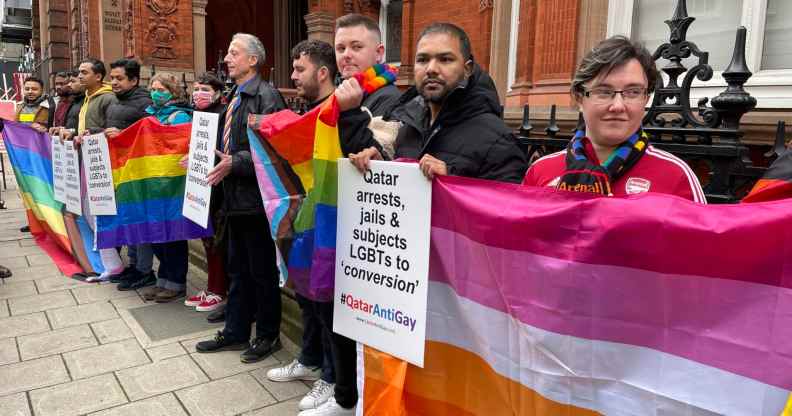 LGBTQ+ activists protest outside the Qatar London embassy.
