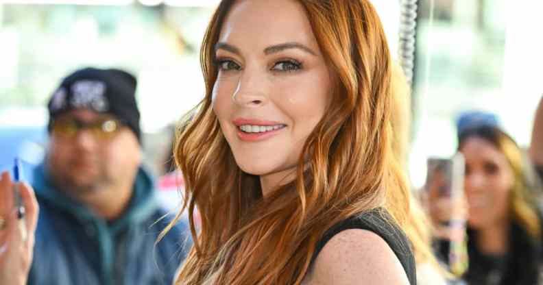 Lindsay Lohan looking over her shoulder and smiling