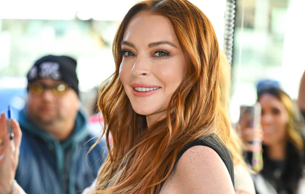 Lindsay Lohan looking over her shoulder and smiling