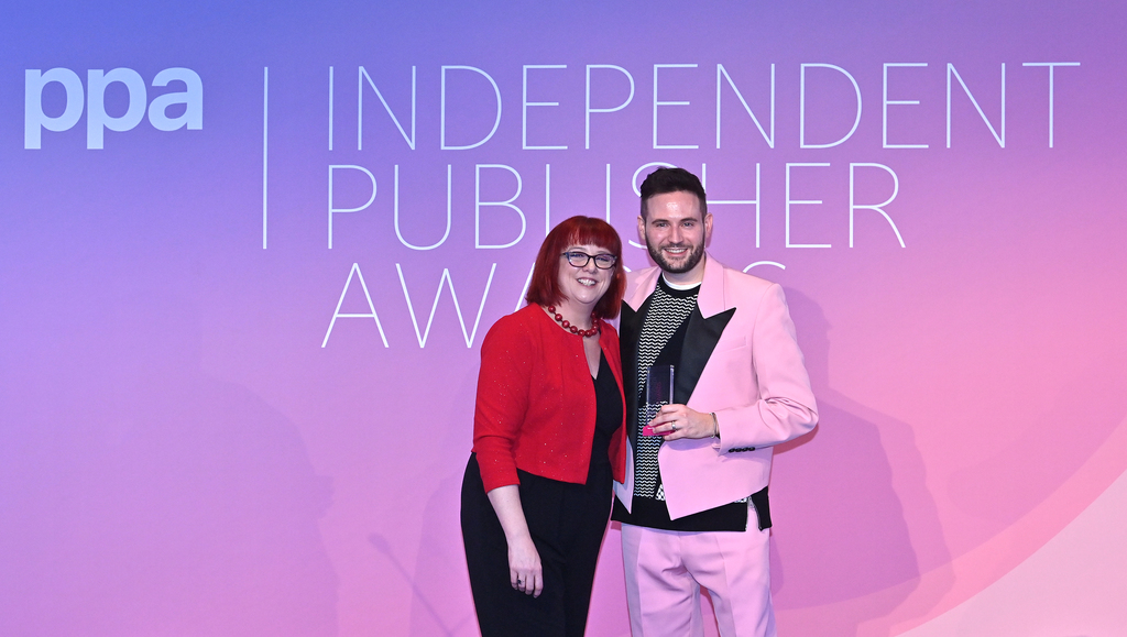 PinkNews' Chief Operating Officer Anthony James standing next to comedian and host Angela Barnes at the PPA Independent Publisher Conference and Awards (PPA)
