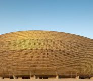 A picture of the golden-brown outer rim of the Lusail stadium in Doha, Qatar