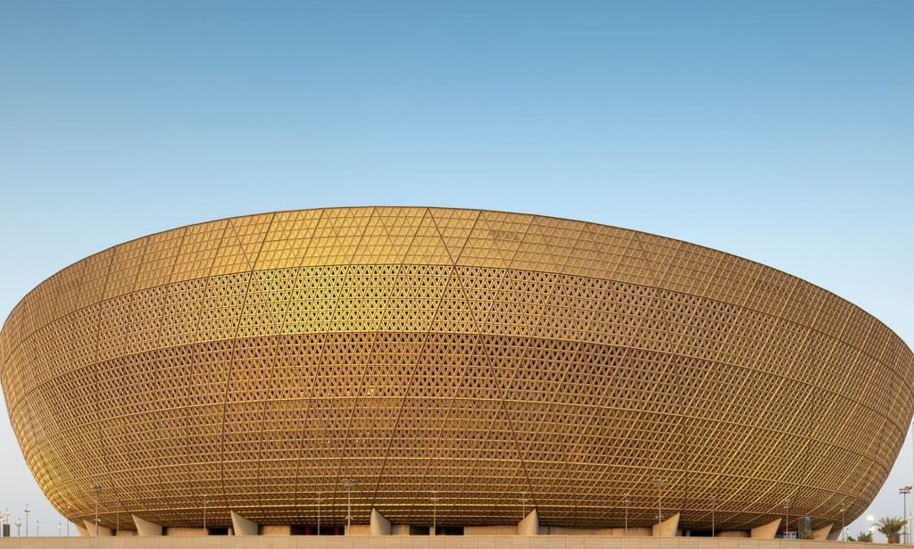 A picture of the golden-brown outer rim of the Lusail stadium in Doha, Qatar