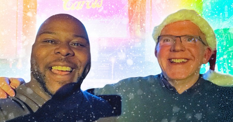 Two carolers with their arms around each other