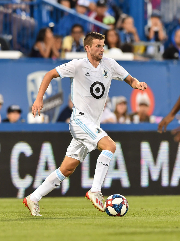 Collin Martin of Minnesota United FC runs the ball against the Montreal Impact during the MLS game at Saputo Stadium on July 6, 2019
