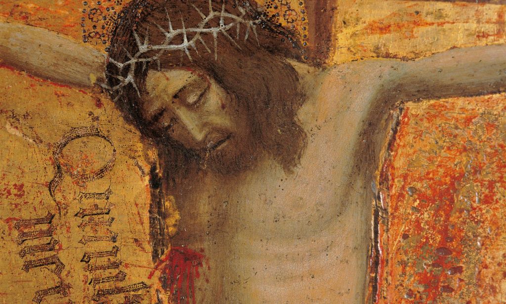 An artistic depiction of Jesus Christ bleeding from a side wound while on the cross