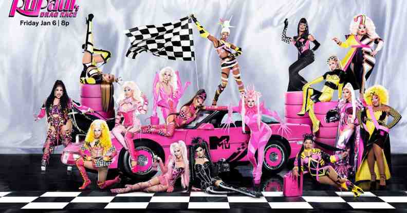 A promotional picture of Drag Race Season 15 showing all the new drag queens posing around a pink sports car