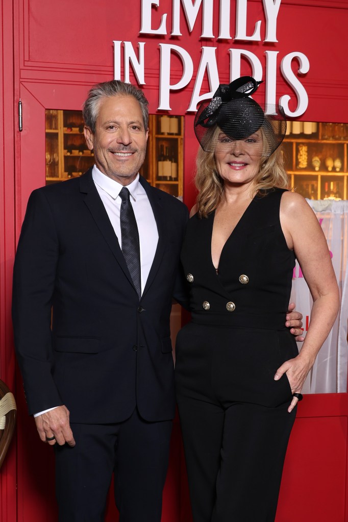 Darren Star (L) and Kim Cattrall attend the Emily In Paris Season 3 Premiere. (Getty)