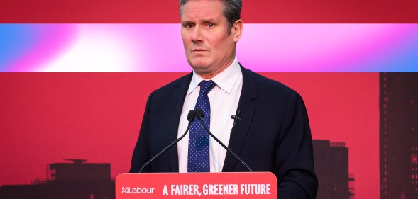 A graphic showing Labour leader Kier Starmer from a political conference with a sign on the podium saying: "A fairer, greener future" and the background