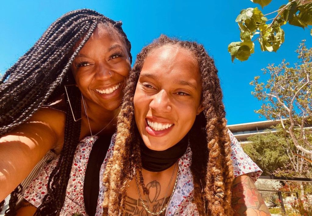 A photo shows Cherelle and Brittney Griner smiling and as they pose together for an Instagram selfie outside a building