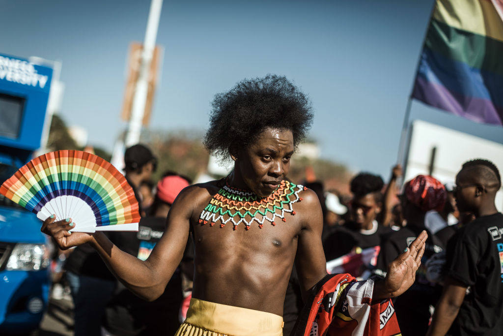 A member of the South African LGBTQ+ community gestures during the annual Gay Pride Parade, as part of the Durban Pride Festival, on June 29, 2019.