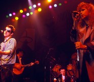 The Pogues perform Fairytale of New York with Kirsty MacColl on stage. (Getty)