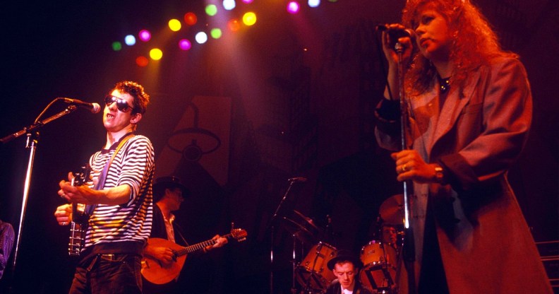 The Pogues perform Fairytale of New York with Kirsty MacColl on stage. (Getty)
