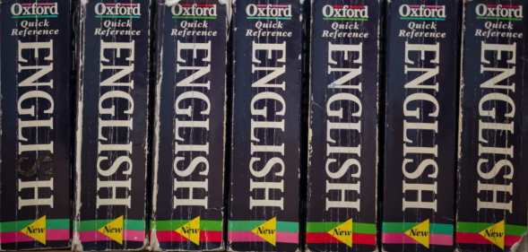 Photo showing copies of the Oxford English Dictionary in a row