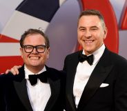 Alan Carr and David Walliams at the premiere of No Time To Die, wearing black suits and bowties.