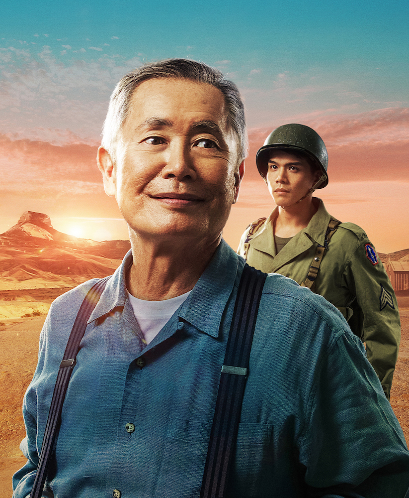 George Takei in a blue shirt with Telly Leung in the background wearing combat uniform 