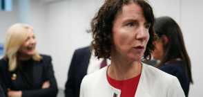 A photo of shadow secretary of state for women and equalities Anneliese Dodds in a white cardigan and red shirt