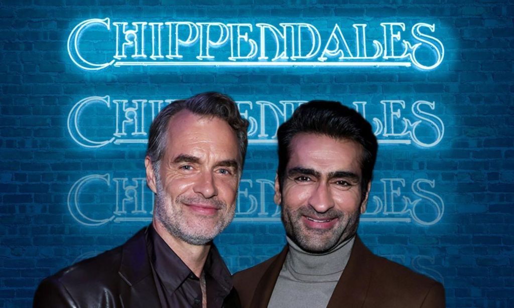 A promo shot for Disney+ series Welcome to Chippendales shows actors Murray Bartlett and Kumail Nanjiani standing next to each other smiling with a blue neon sign behind them says: "Chippendales"